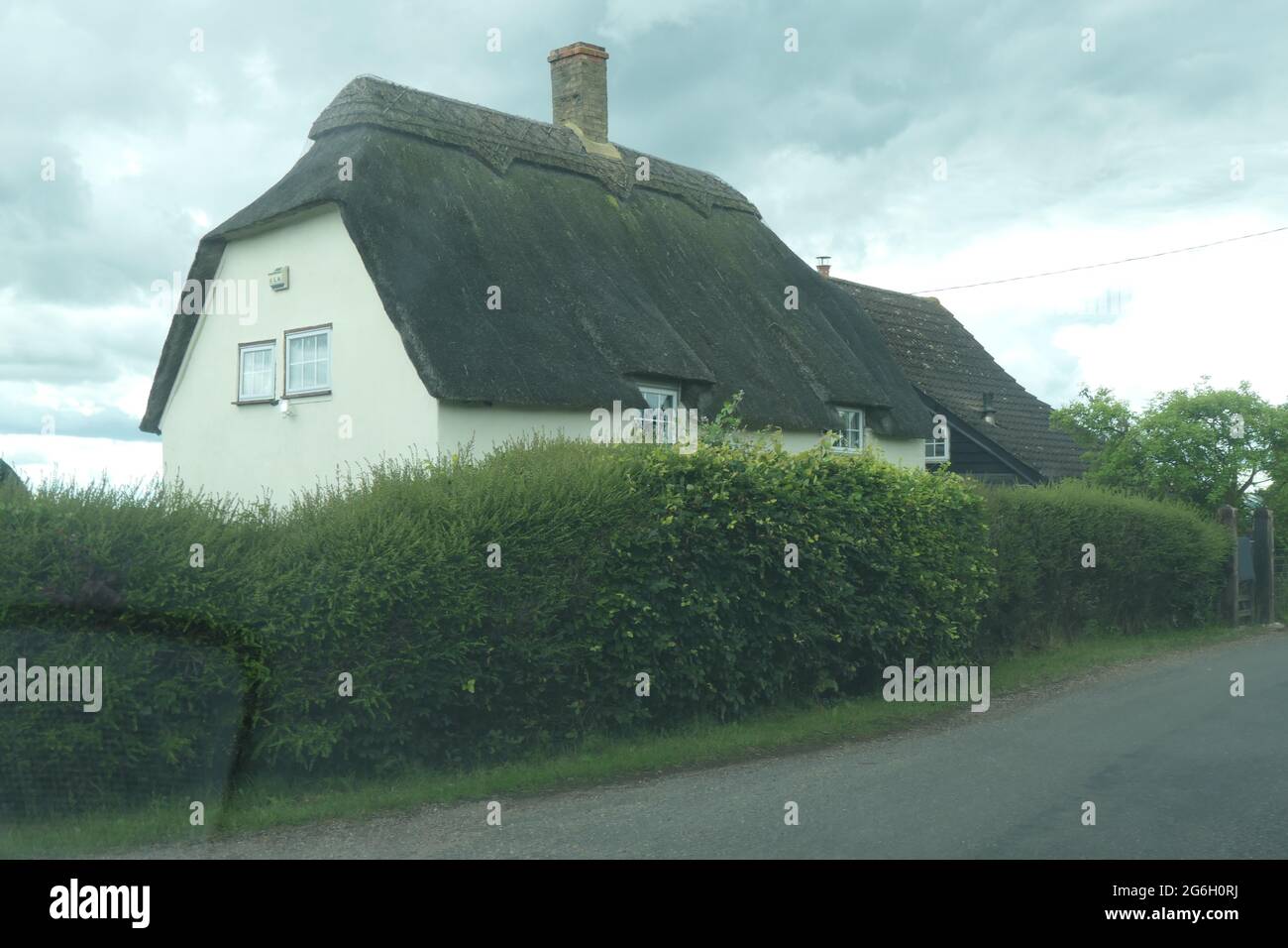 Thatched cottage in England Stock Photo Alamy