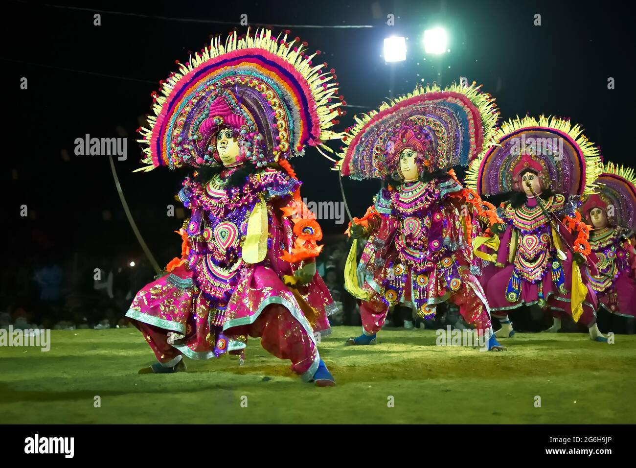 BAMNIA, PURULIA, WEST BENGAL , INDIA - DECEMBER 23RD 2015 : Four dancers performing at Chhau Dance festival. It is a very popular Indian tribal martia Stock Photo