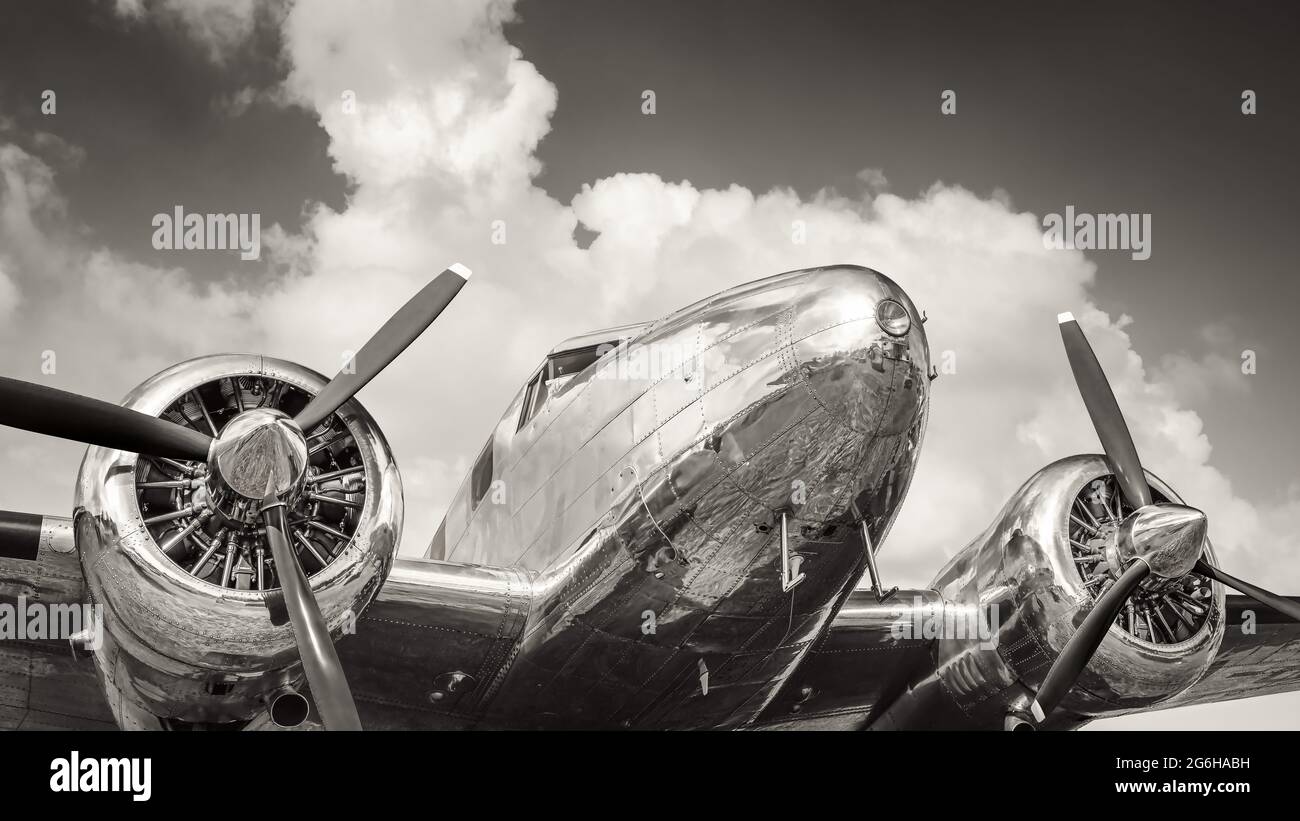 historical aircraft against a cloudy sky Stock Photo