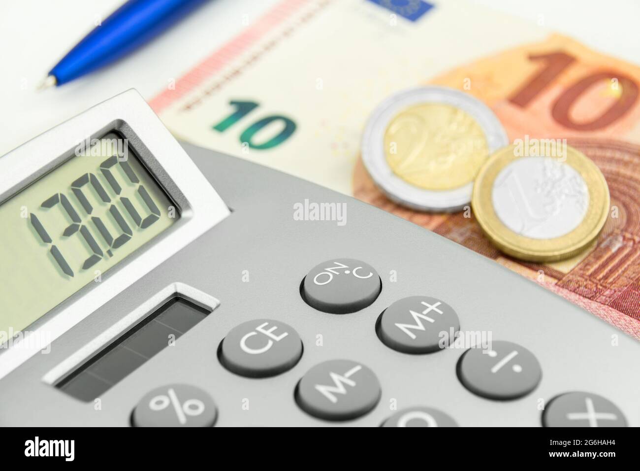 13,00 Euro and calculator closeup Stock Photo