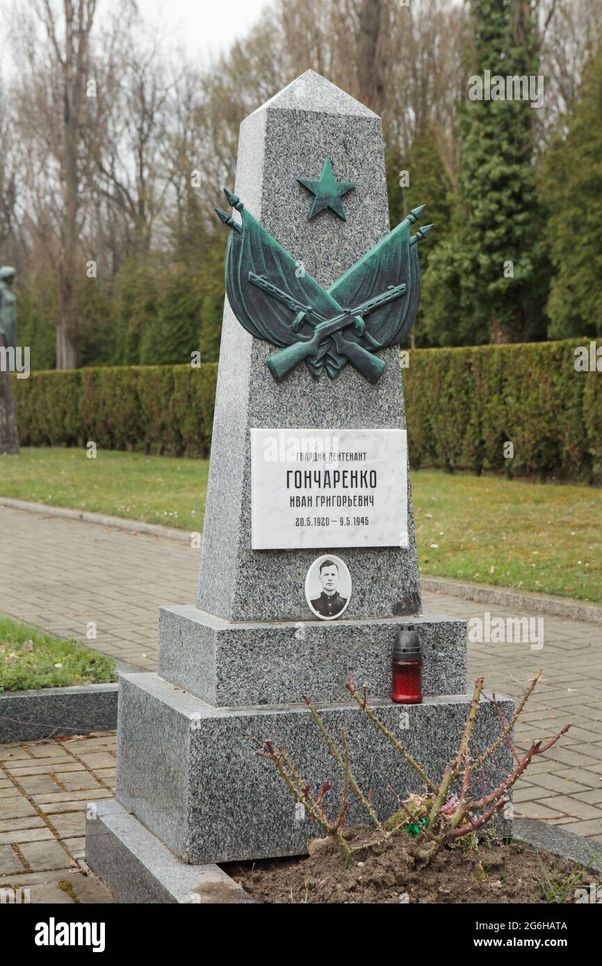 Grave of Soviet lieutenant Ivan Goncharenko in the area of the Soviet war memorial at Olšany Cemetery in Prague, Czech Republic. Red Army lieutenant Ivan Goncharenko (also spelled as Ivan Gončarenko) was a commander of the first Soviet tank T-34 which entered into Prague on 9 May 1945 at the morning. The tank was hit by the Nazi Germans near the Manes Bridge (Mánesův Bridge) and Goncharenko died at age 24, becoming the first and one of the few Soviet soldiers who died in Prague during the liberation of the capital of Czechoslovakia during World War II. The grave is pictured after the restorati Stock Photo