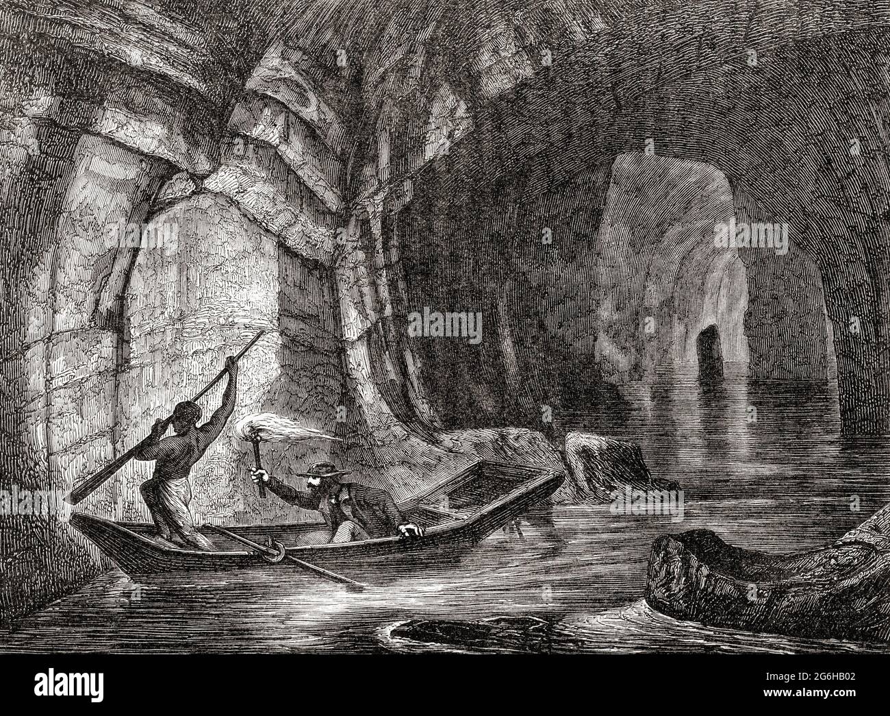 Exploring the Styx, a subterranean river in the Mammoth Cave National Park, west-central Kentucky, United States of America, seen here in the 19th century.  The longest cave system known in the world, this is now an UNESCO World Heritage Site.  From The Universe or, The Infinitely Great and the Infinitely Little, published 1882. Stock Photo