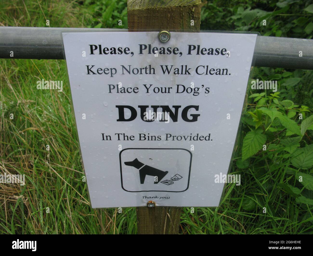 Place your dogs dung in the bin sign. South west coast path. North