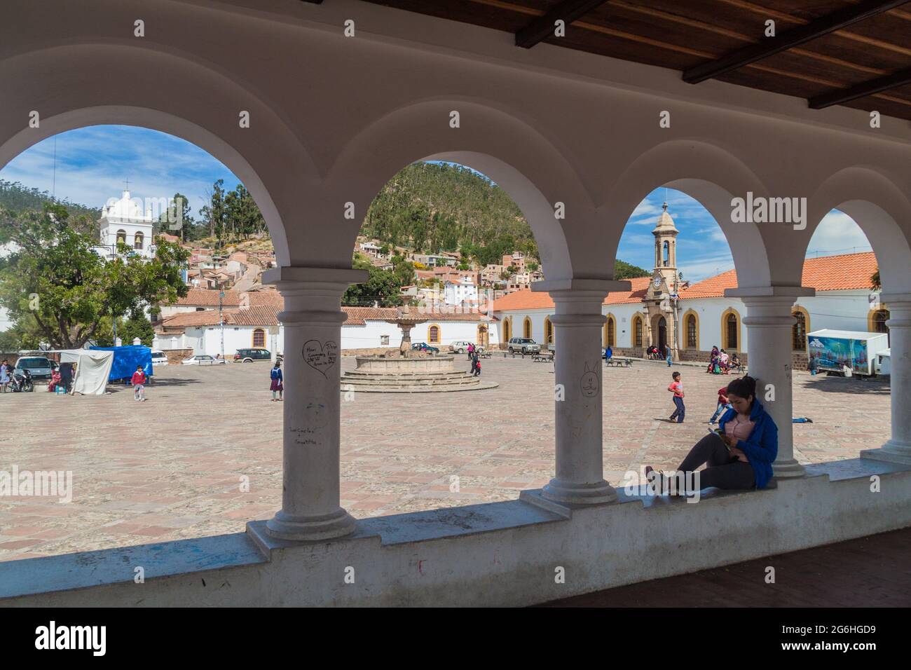 SUCRE, BOLIVIA - APRIL 22, 2015: White colonial houses and an archway on Plaza Anzures square in Sucre, capital of Bolivia. Stock Photo