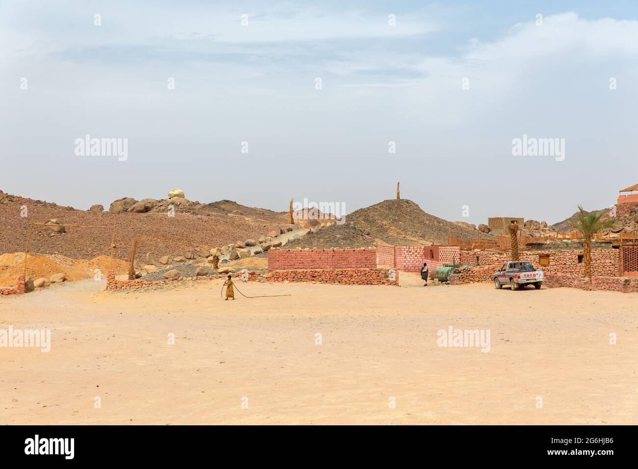 HURGHADA, EGYPT - MAY 18, 2015:The boy goes to fetch water in a Bedouin village Stock Photo