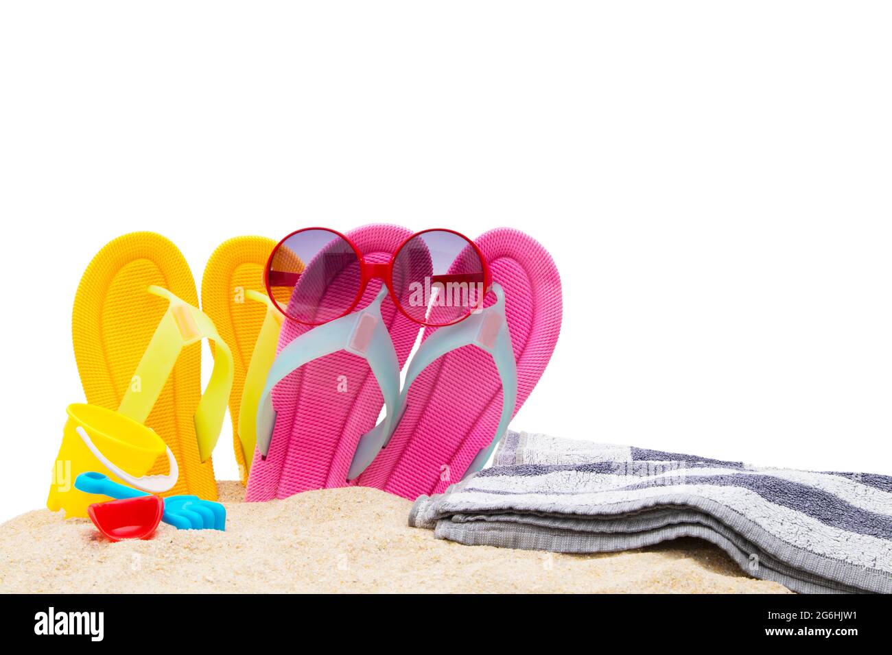 beach sand with flip flops and towel Stock Photo - Alamy