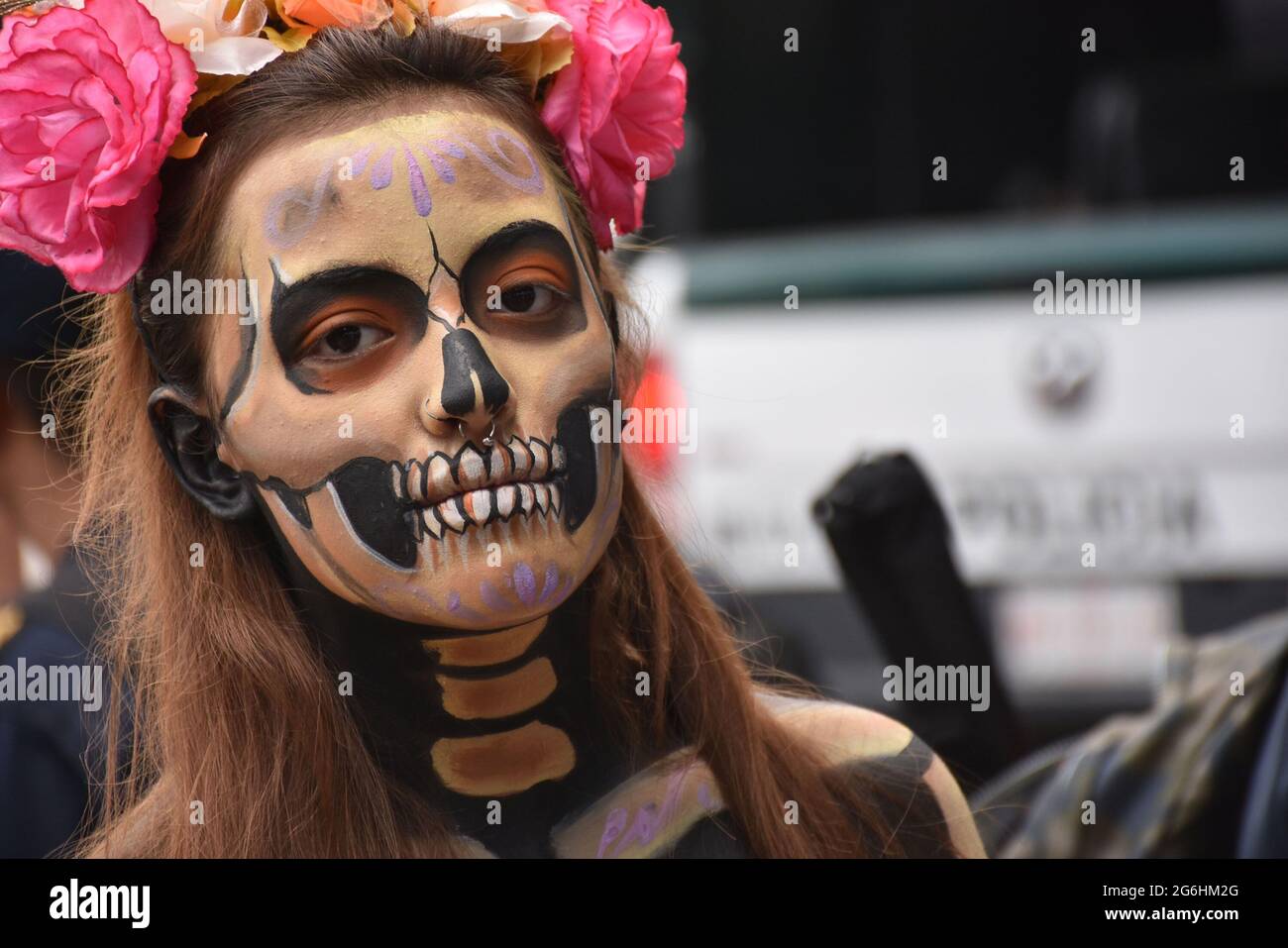 People dress as Catrina, an iconic image for Day of the Dead in Mexico, and participate in a parade the week before Day of the Dead. Stock Photo