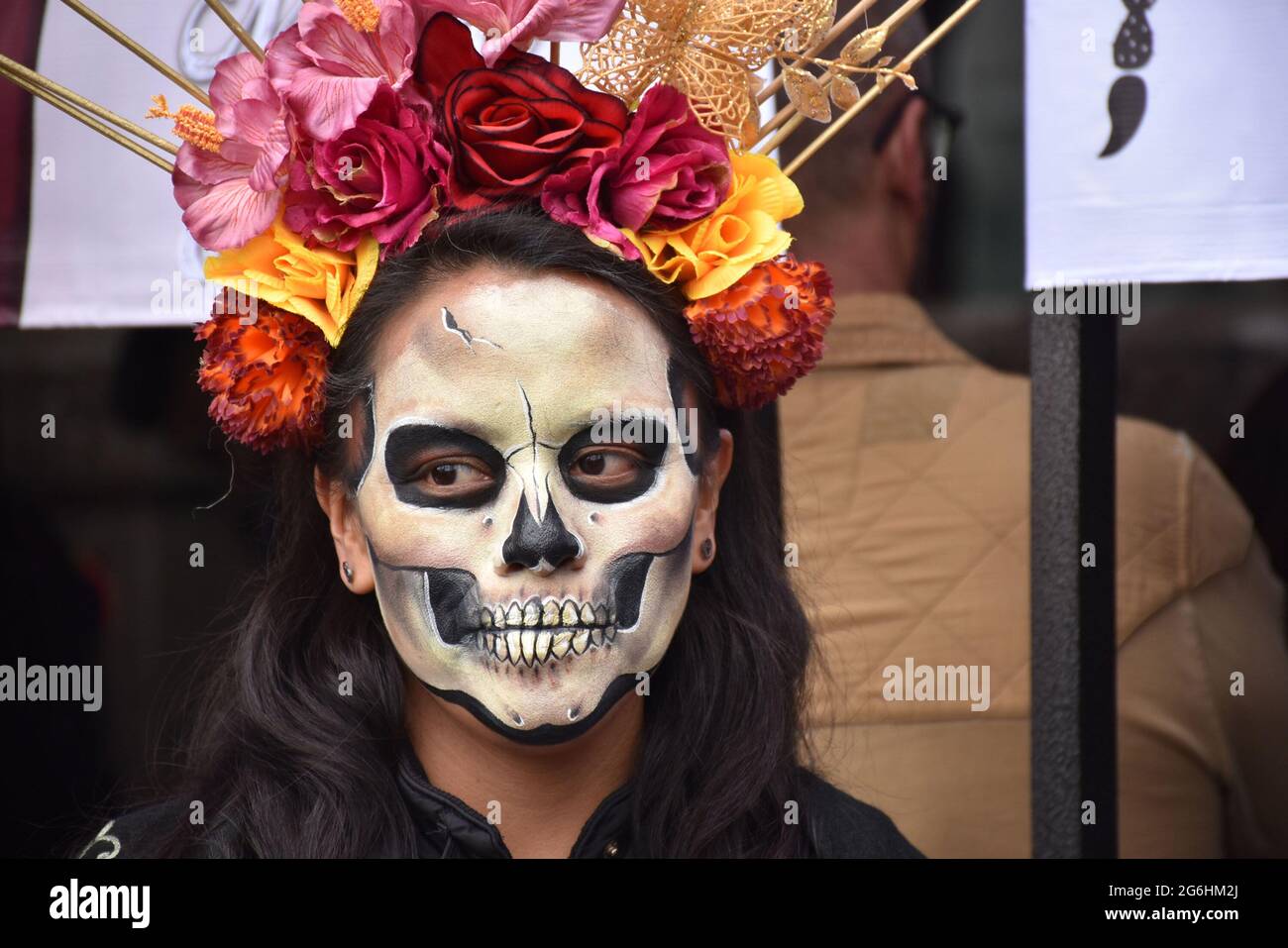 People dress as Catrina, an iconic image for Day of the Dead in Mexico, and participate in a parade the week before Day of the Dead. Stock Photo
