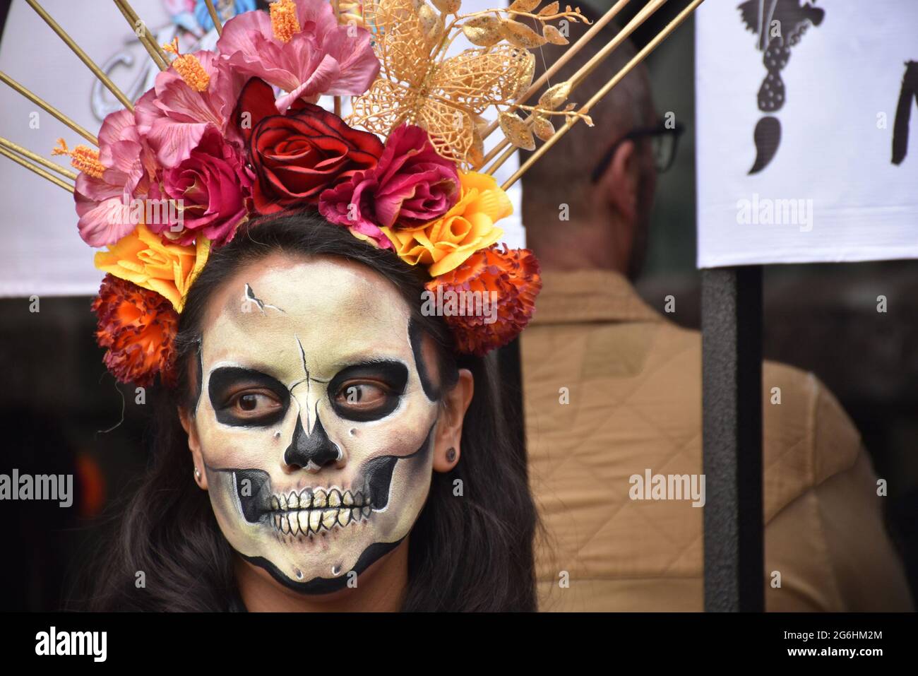 People dress as Catrina, an iconic image for Day of the Dead in Mexico, and participate in a parade the week before Day of the Dead. Stock Photo
