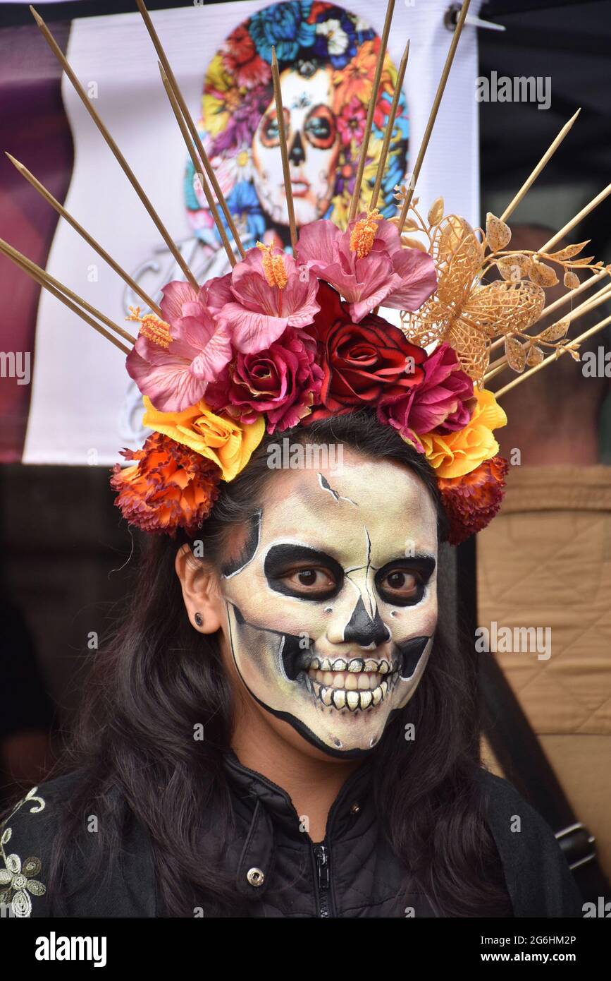 People dress as Catrina, an iconic image for Day of the Dead in Mexico, and participate in a parade the week before Day of the Dead. Stock Photo