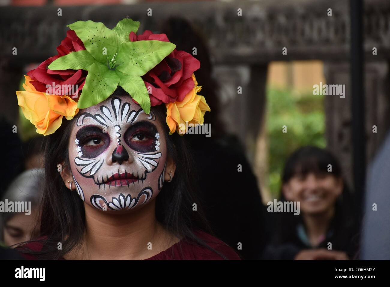 People dress as Catrina, an iconic image for Day of the Dead in Mexico, and participate in a parade the week before Day of the Dead. Stock Photo