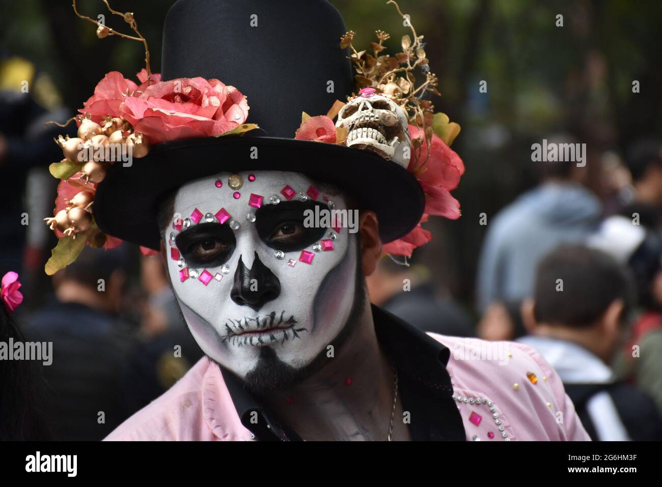 People dress as Catrina, an iconic image for Day of the Dead in Mexico, and participate in a parade the week before Day of the Dead. Stock Photo