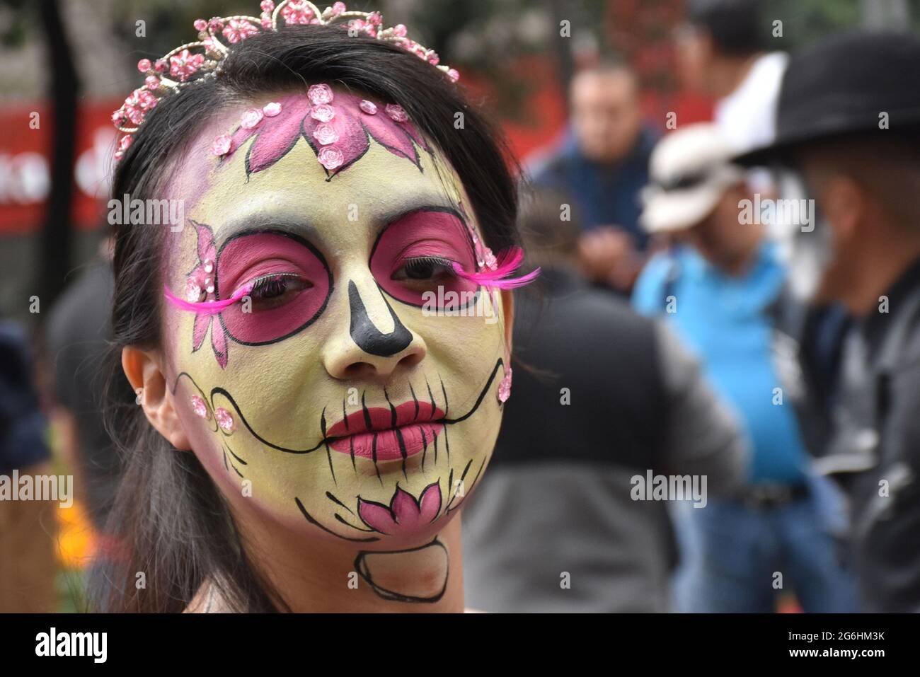 People dress as Catrina, an iconic image for Day of the Dead in Mexico, and participate in a parade the week before Day of the Dead. Stock Photo