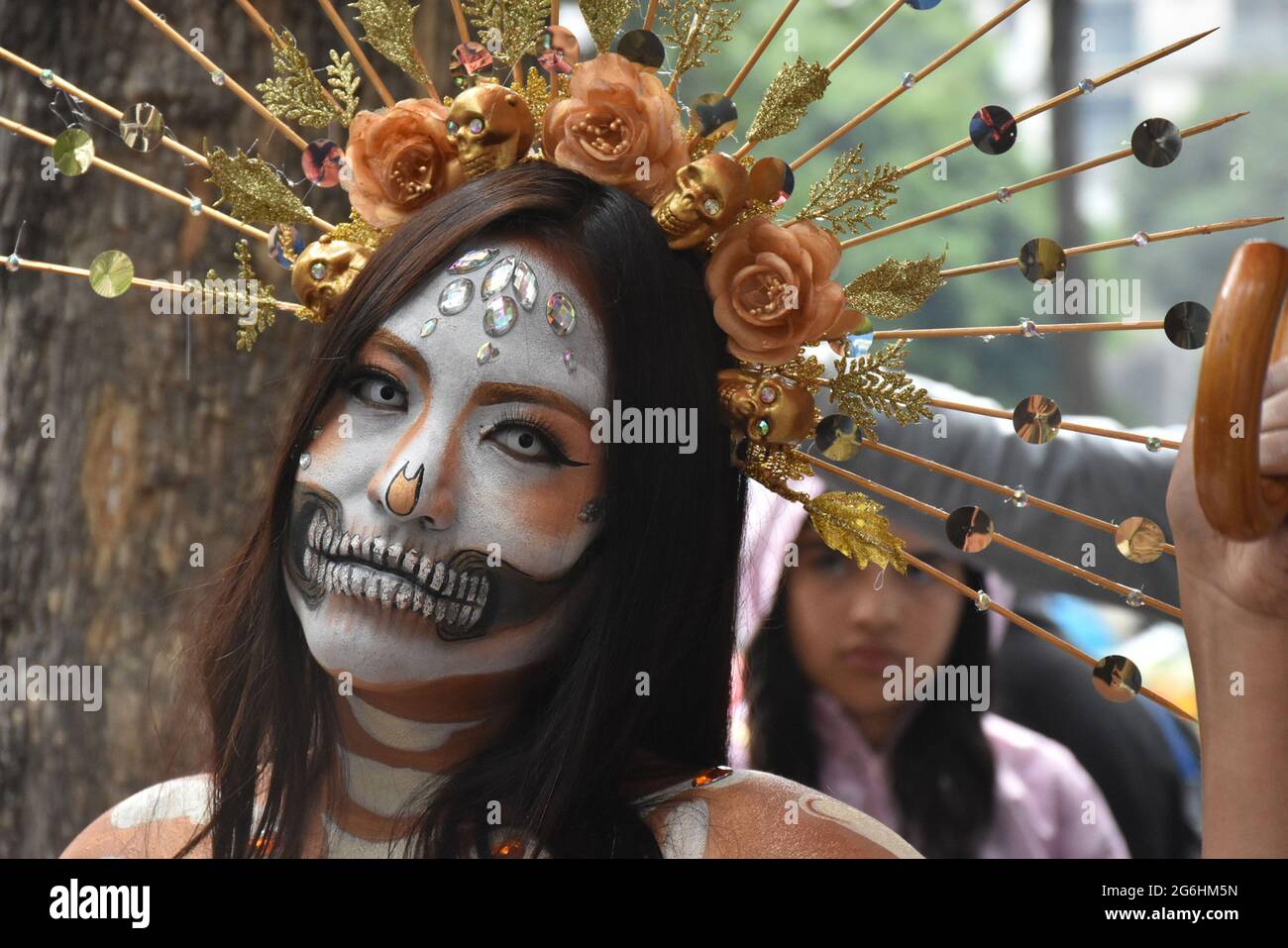 People dress as Catrina, an iconic image for Day of the Dead in Mexico, and participate in a parade the week before Day of the Dead. Stock Photo
