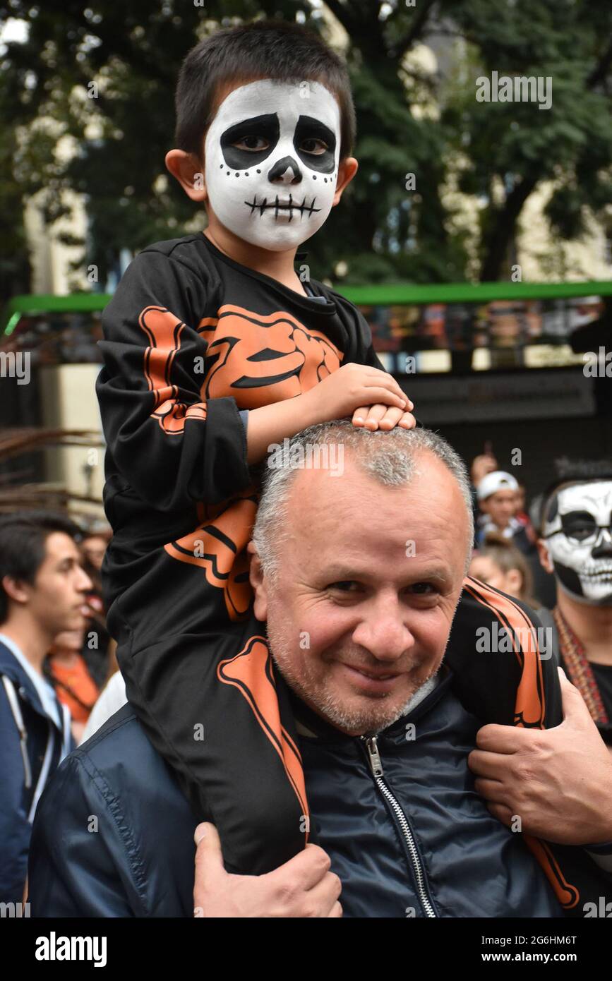 People dress as Catrina, an iconic image for Day of the Dead in Mexico, and participate in a parade the week before Day of the Dead. Stock Photo