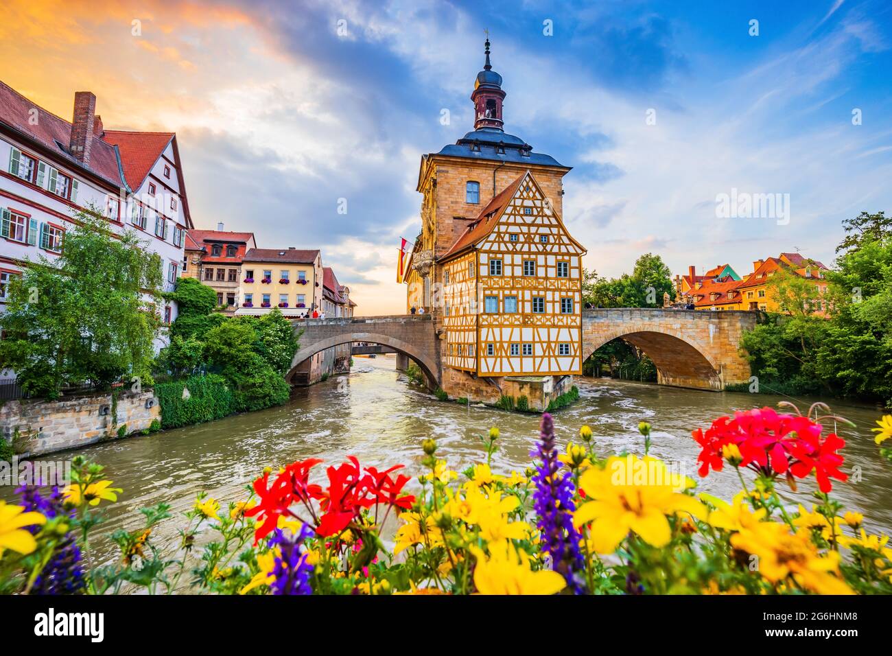 Bamberg, Germany. Town Hall of Bamberg (Altes Rathaus) with two bridges over the Regnitz river. Upper Franconia, Bavaria. Stock Photo