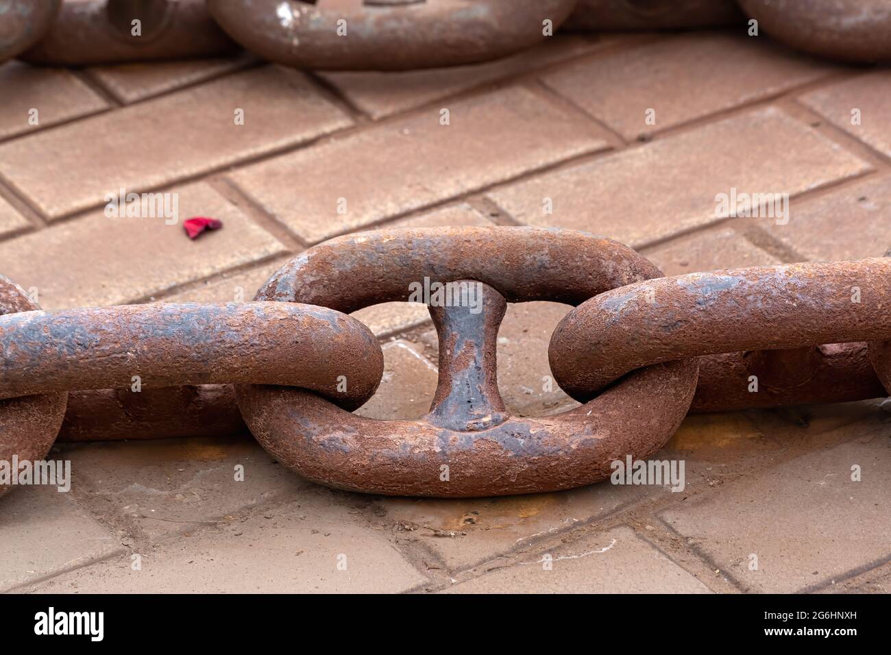Rusty ship anchor chain of stud link type on a ferry port in Istanbul, Turkey. Stock Photo