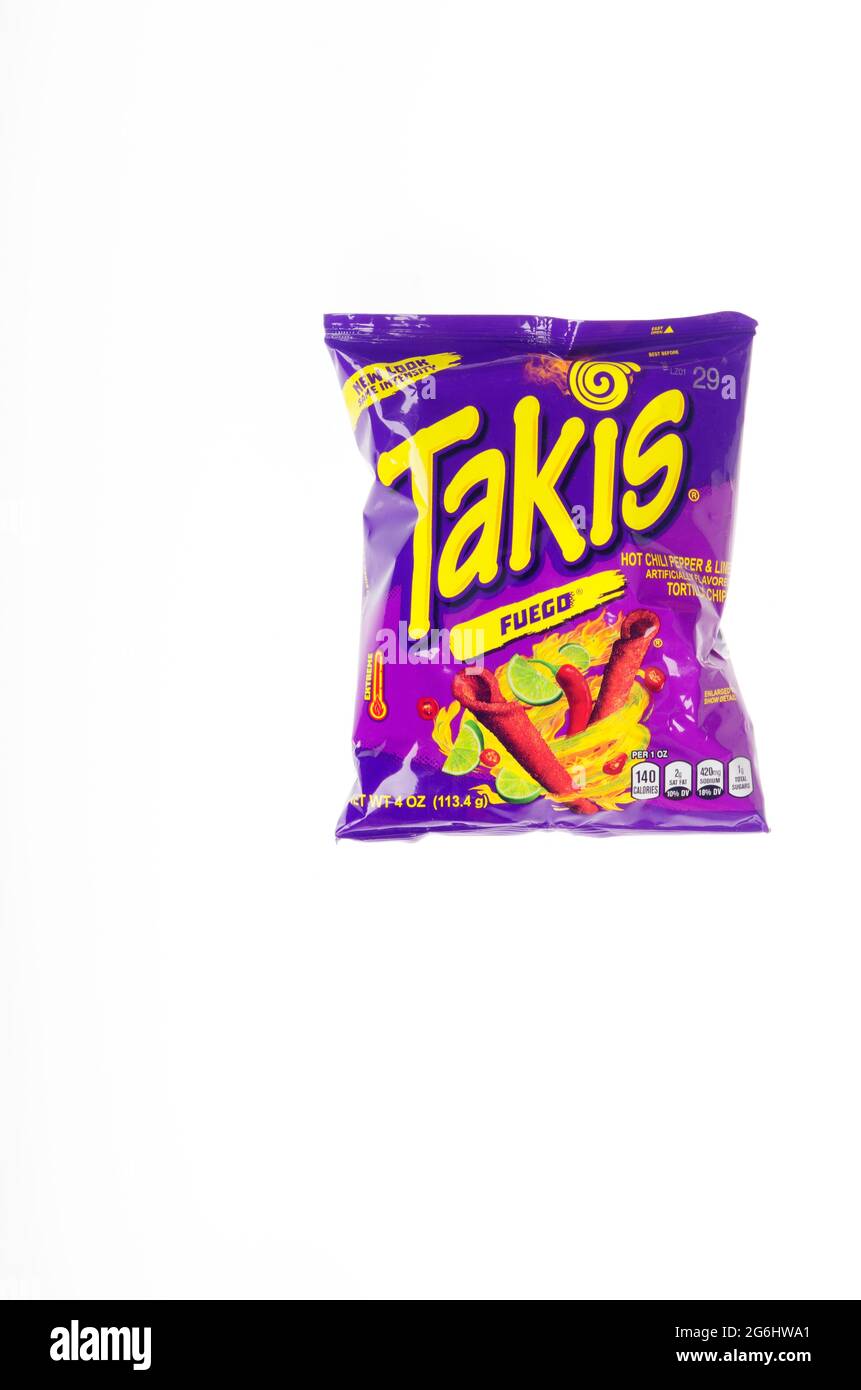 Takis Bag of Hot Fuego Snacks, Rolled Corn Tortilla Chips, a Mexican food made by Barcel a subsidiary of Grupo Bimbo Stock Photo