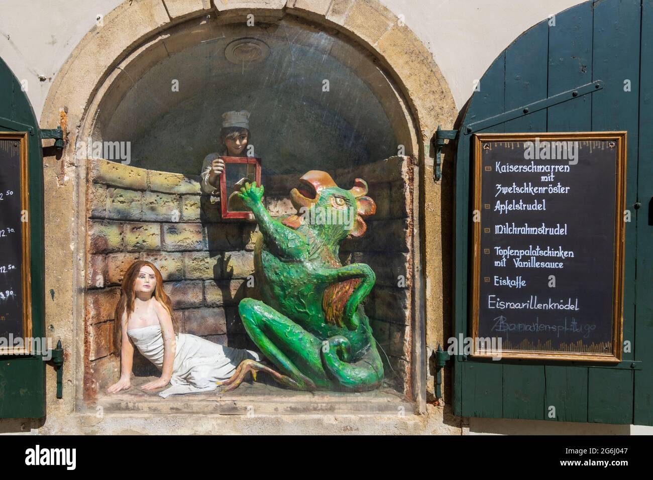 Wien, Vienna Basilisk in window of a restaurant, alley