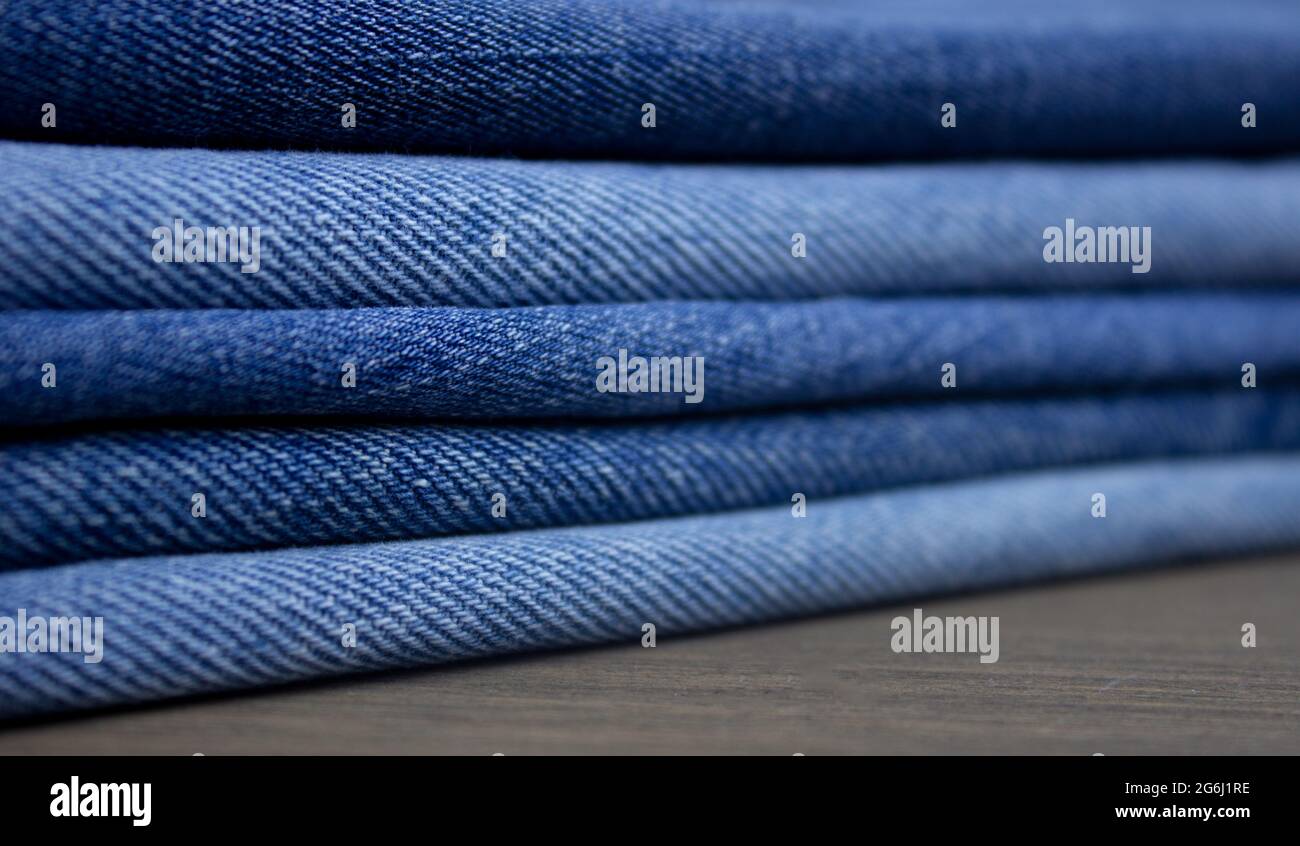 A stack of denim. Color denim closeup texture Stock Photo Alamy