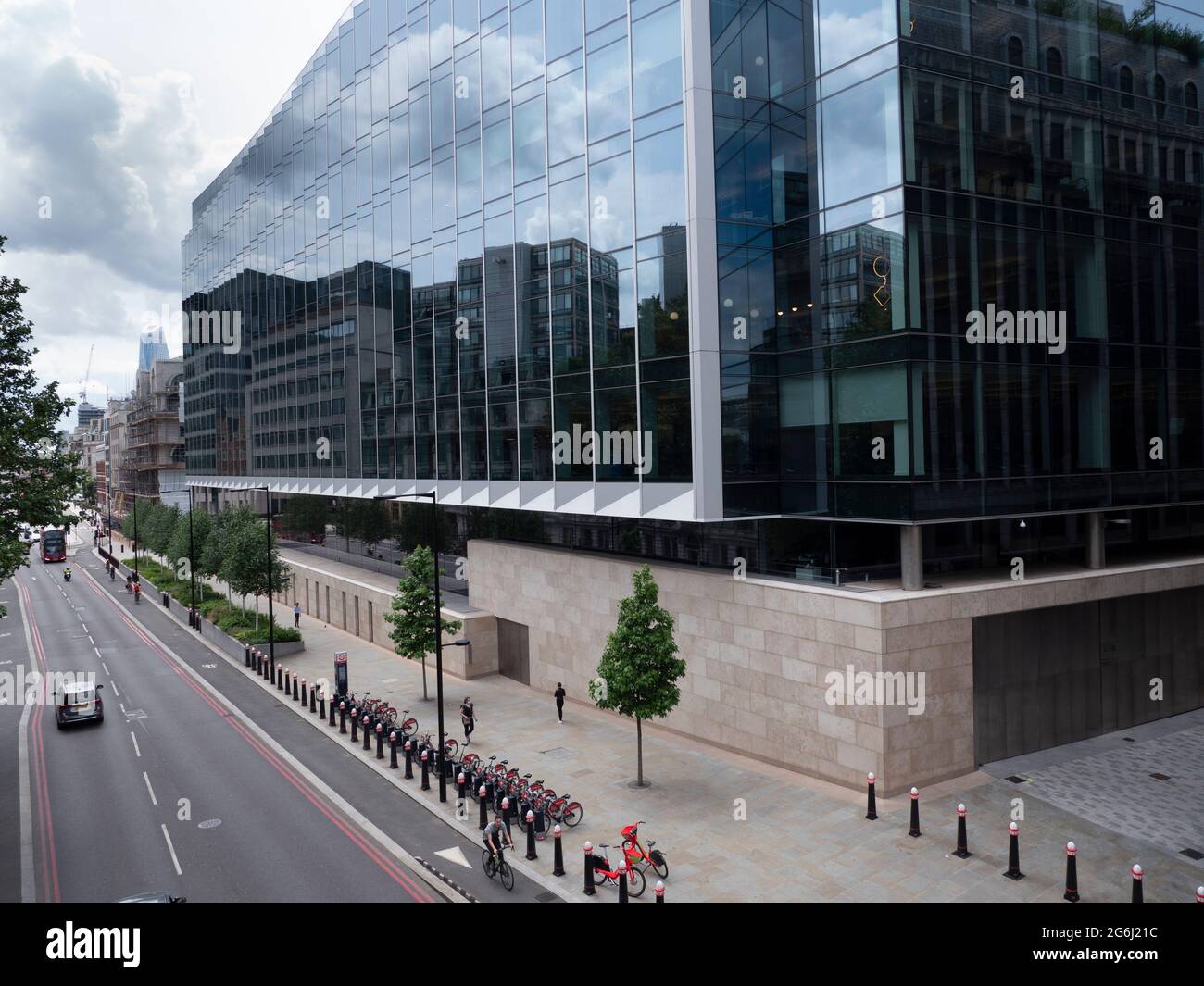 Dragon on Holborn Viaduct in the City of London with Goldman Sachs