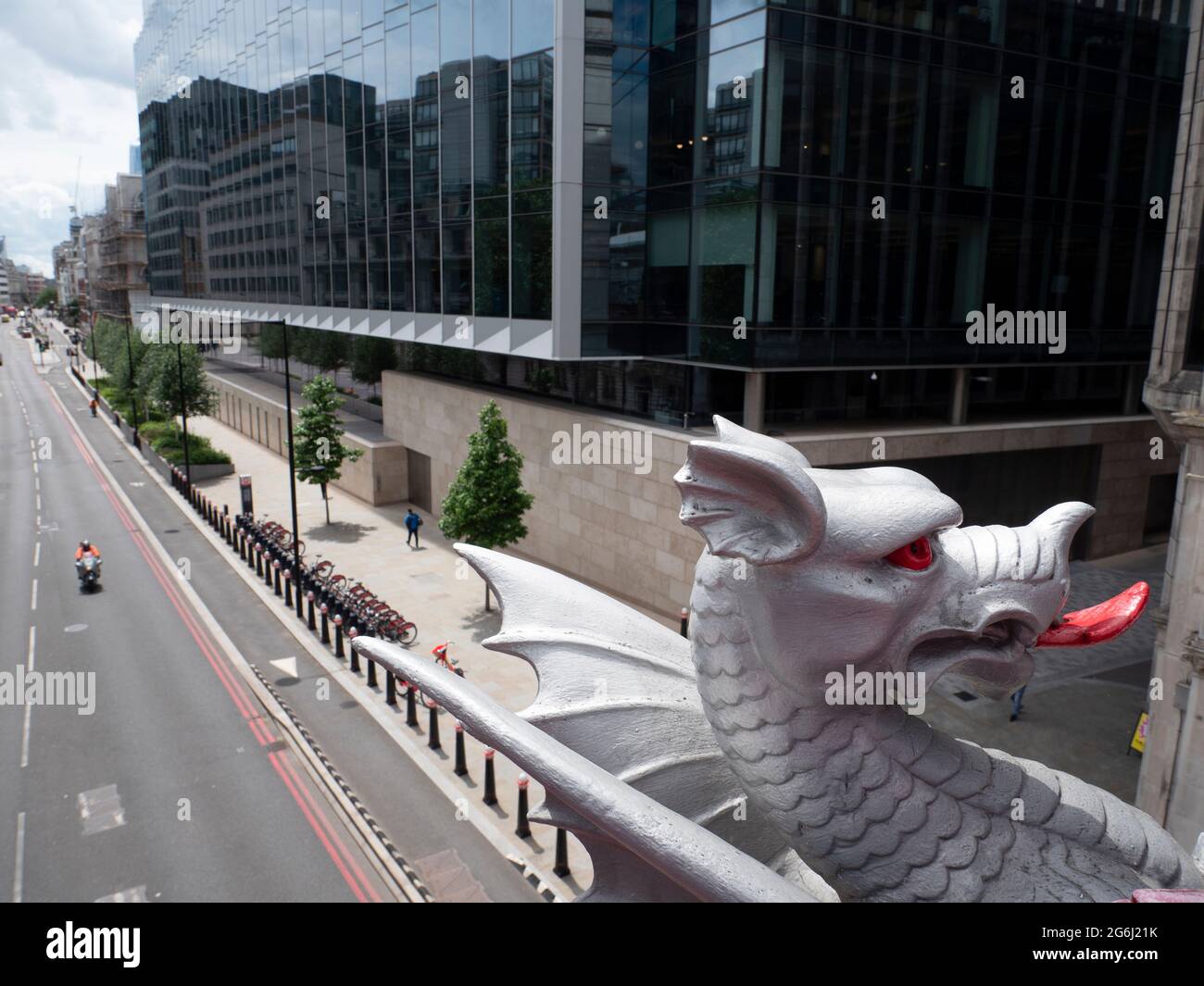 Dragon on Holborn Viaduct in the City of London with Goldman Sachs