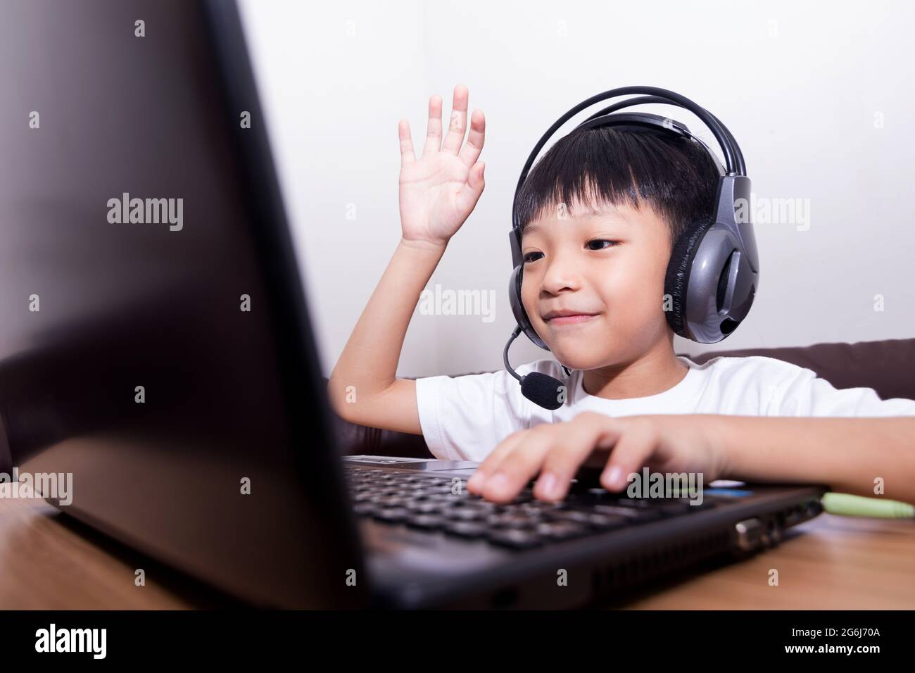 Asian boy student online learning class study online video call teacher ...