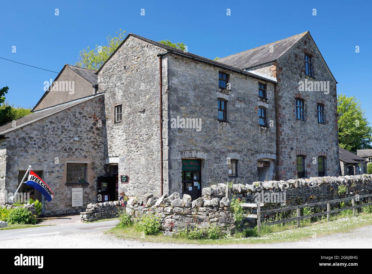 Exterior photograph of Gleaston Water Mill on the Furness peninsular in Cumbria, UK. Photographed from the public road. Stock Photo