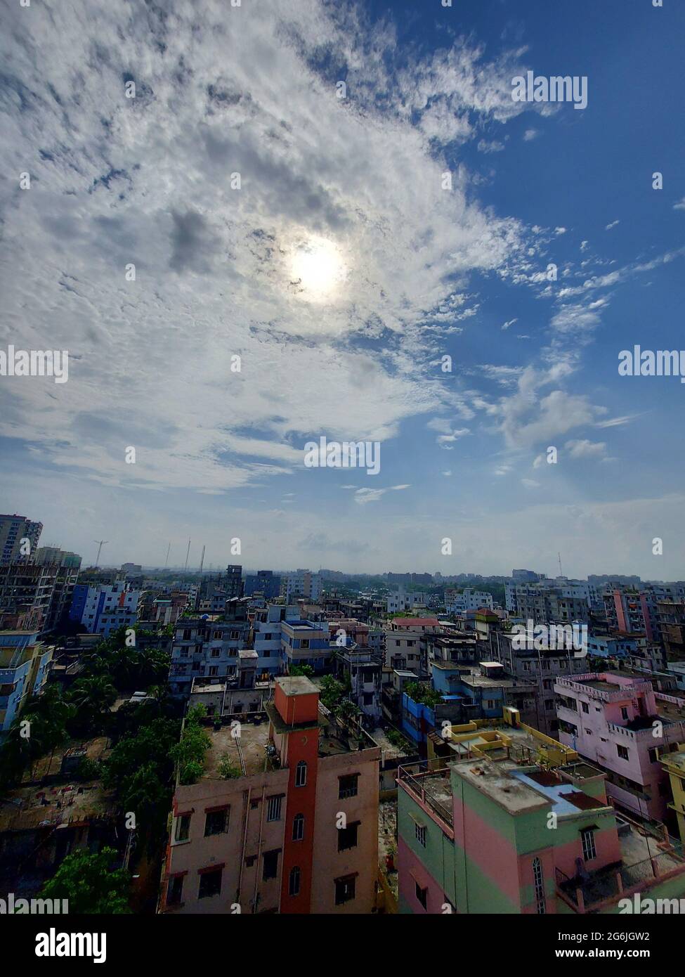 Bangladesh capital Dhaka city landscape on a sunny morning. Blue sky Dhaka city tope view. Beautiful Bangladesh city from top. Stock Photo