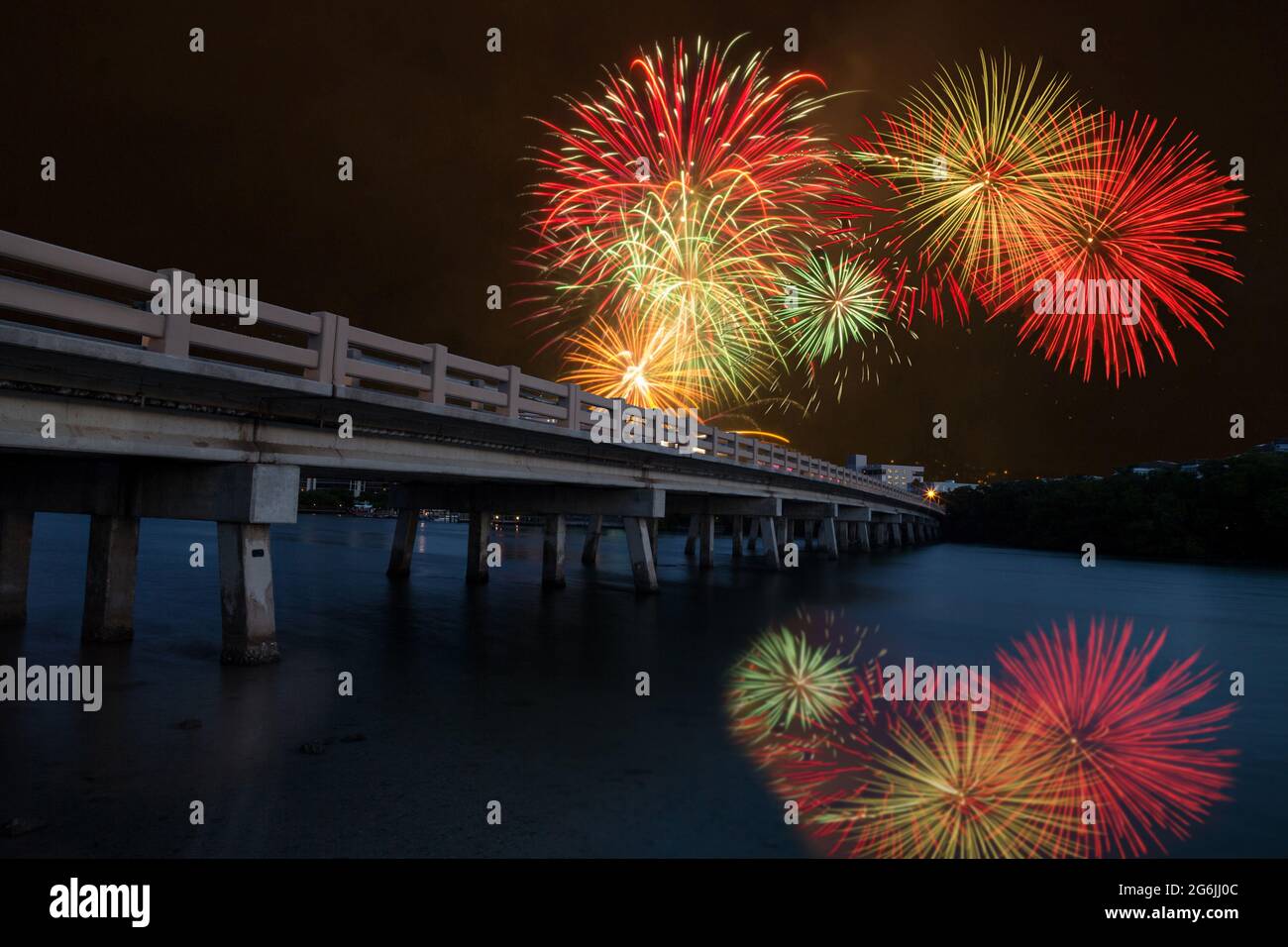 Fireworks over bridge over Hickory Pass leading to the ocean in Bonita