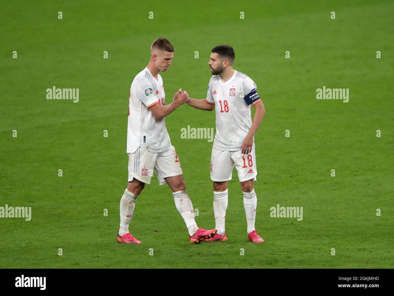 Spain's Dani Olmo (left) reacts after missing his penalty during the UEFA Euro 2020 semi final match at Wembley Stadium, London. Picture date: Tuesday July 6, 2021. Stock Photo