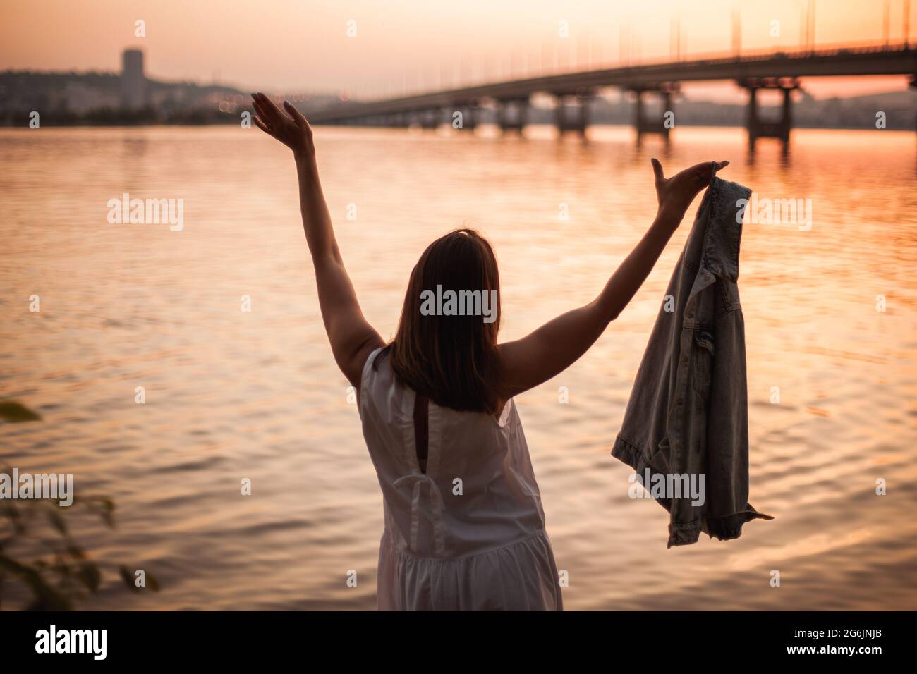 Woman looking up sky night hi-res stock photography and images - Alamy