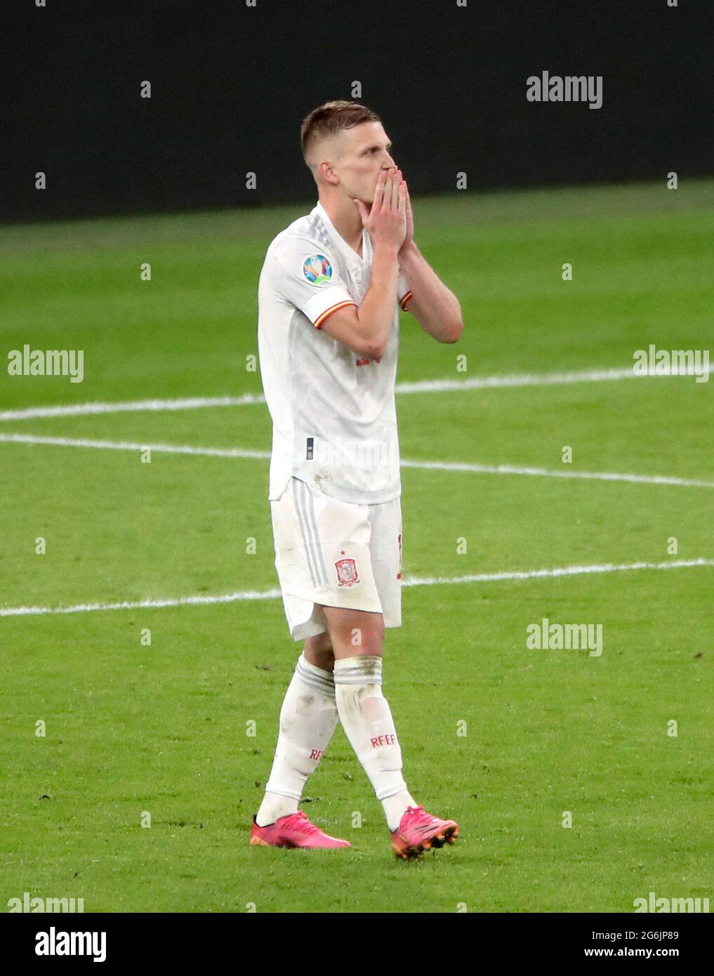 Spain's Dani Olmo reacts after missing his penalty during the UEFA Euro 2020 semi final match at Wembley Stadium, London. Picture date: Tuesday July 6, 2021. Stock Photo