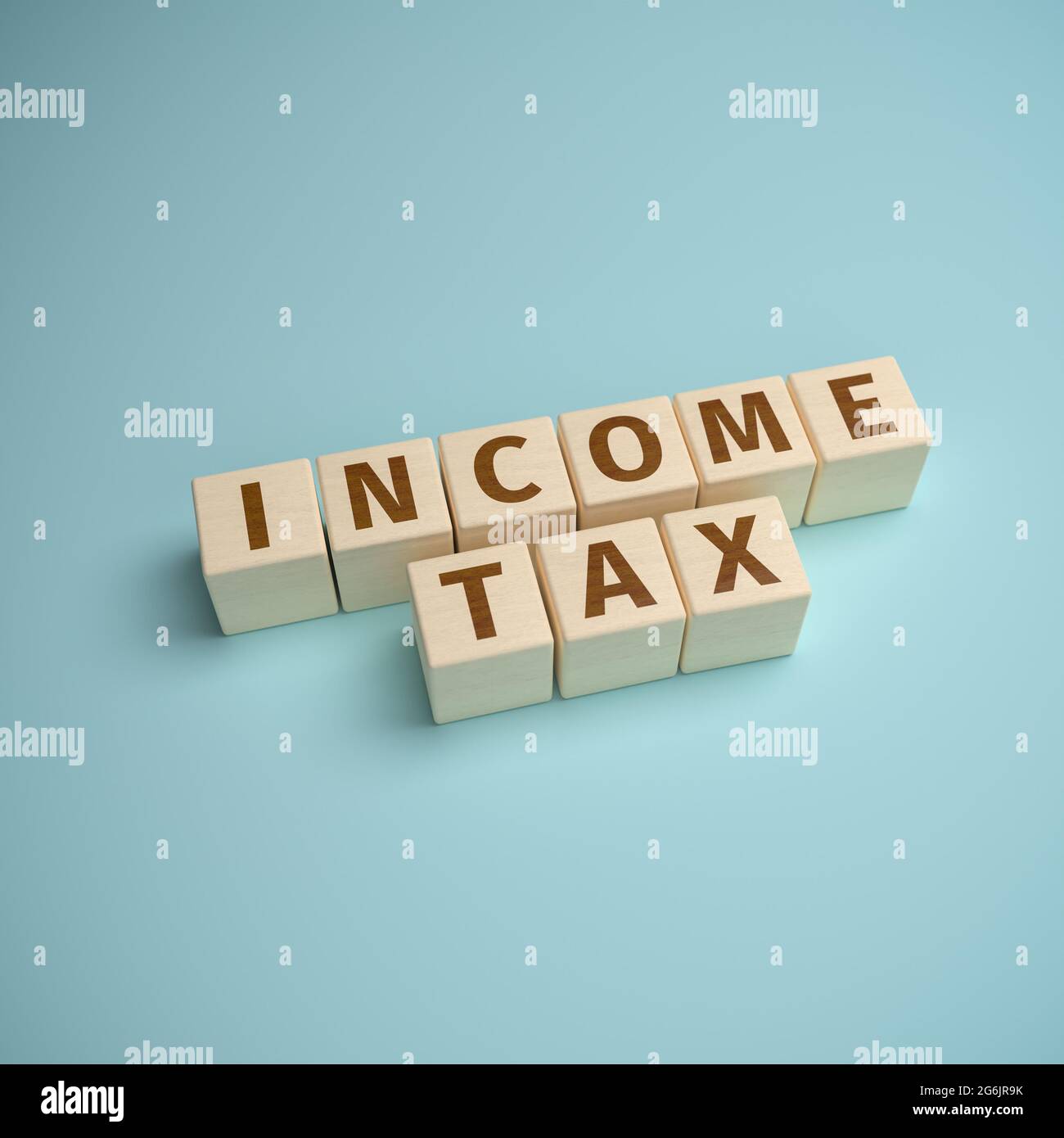 Wooden toy blocks forming the words tax Stock Photo Alamy