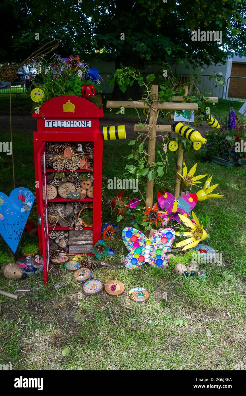 East Molesey, Surrey, UK. 5th July, 2021. Knaphill Lower School, Operation Pollination Activation, part of the It's a Wild World, RHS Hampton Court Palace Garden Festival Schools Feature. Children from various schools have designed habitats aimed at encouraging wildlife. Credit: Maureen McLean/Alamy Stock Photo