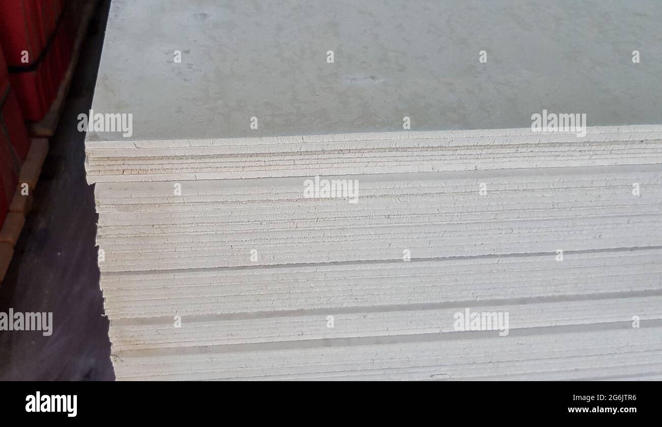 Stack of gypsum boards. Drywall packs. Closeup Stock Photo Alamy