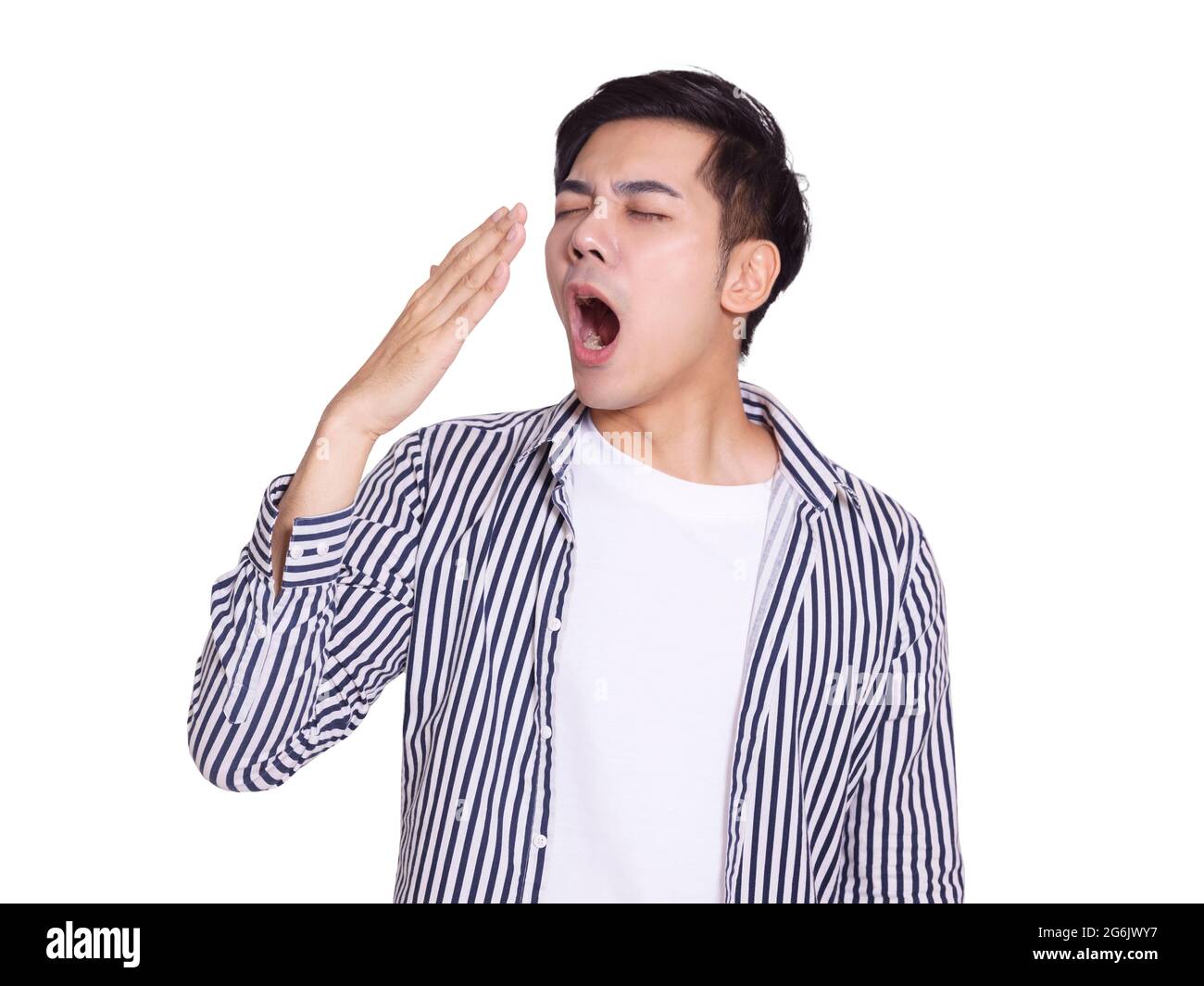 Young handsome man yawning and feel tired Stock Photo
