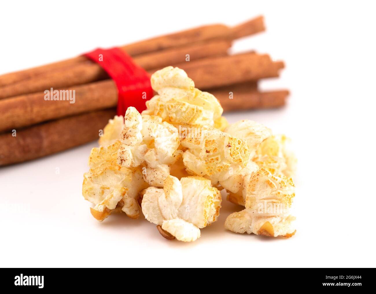 Cinnamon Toast Flavored Popcorn on a White Background Stock Photo