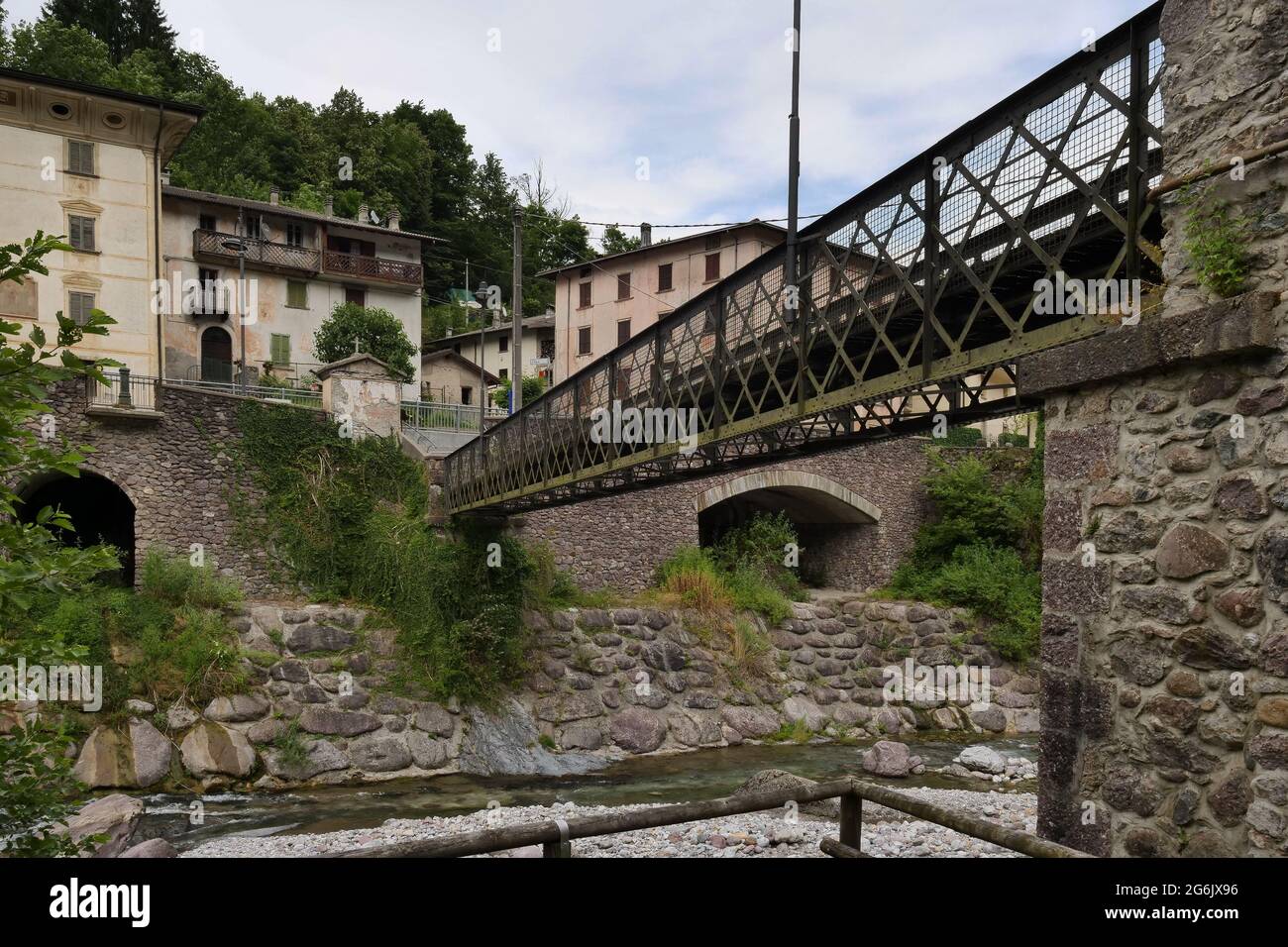 Bridge in small town of the Cassiglio 113 inhabitants in Brembana Valley Bergamo, Italy Stock Photo