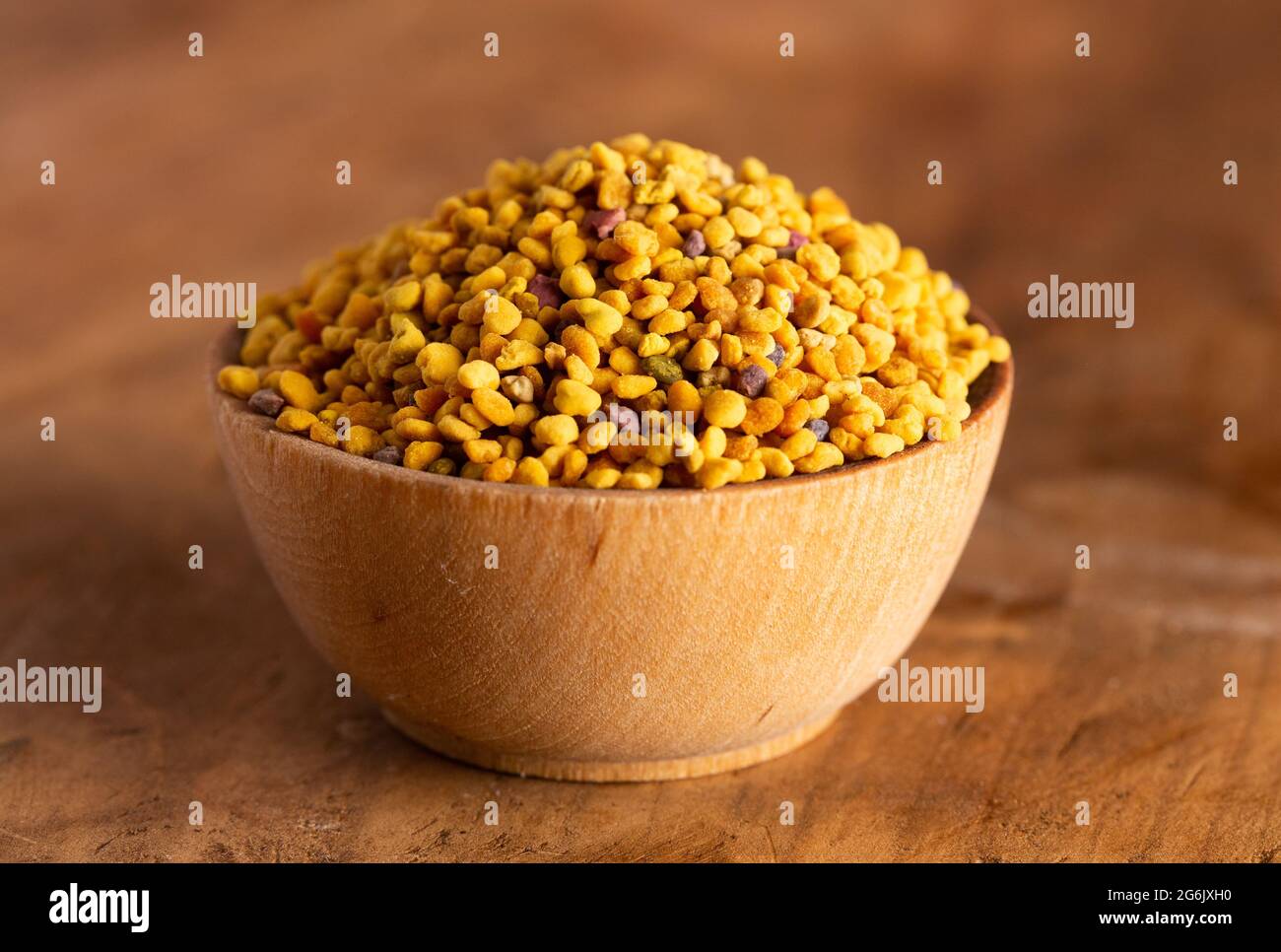 A Bowl of Pellets of Yellow Bee Pollen Stock Photo