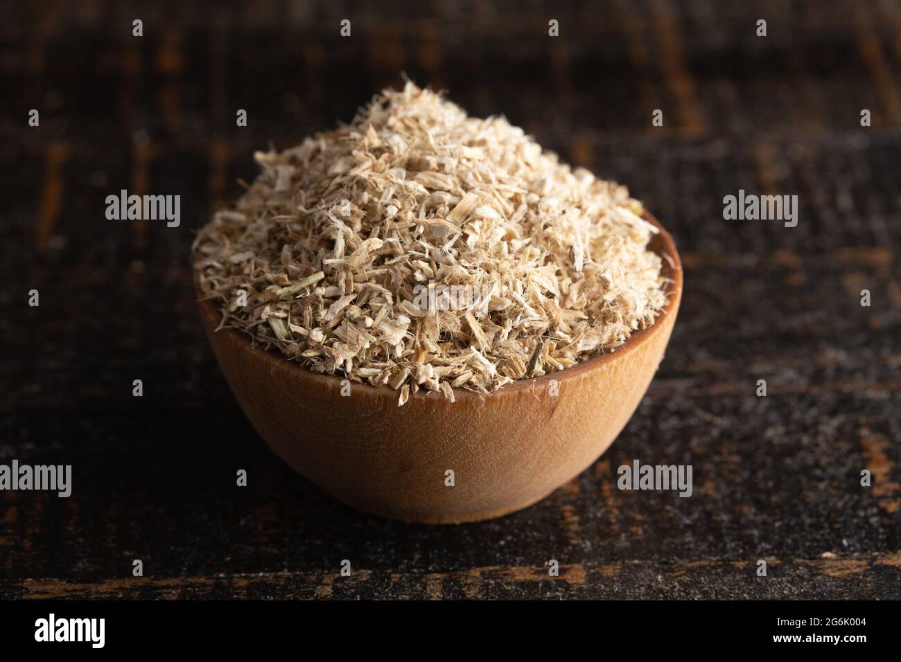 Dried Marshmallow Root Herb in a Wooden Bowl Stock Photo Alamy