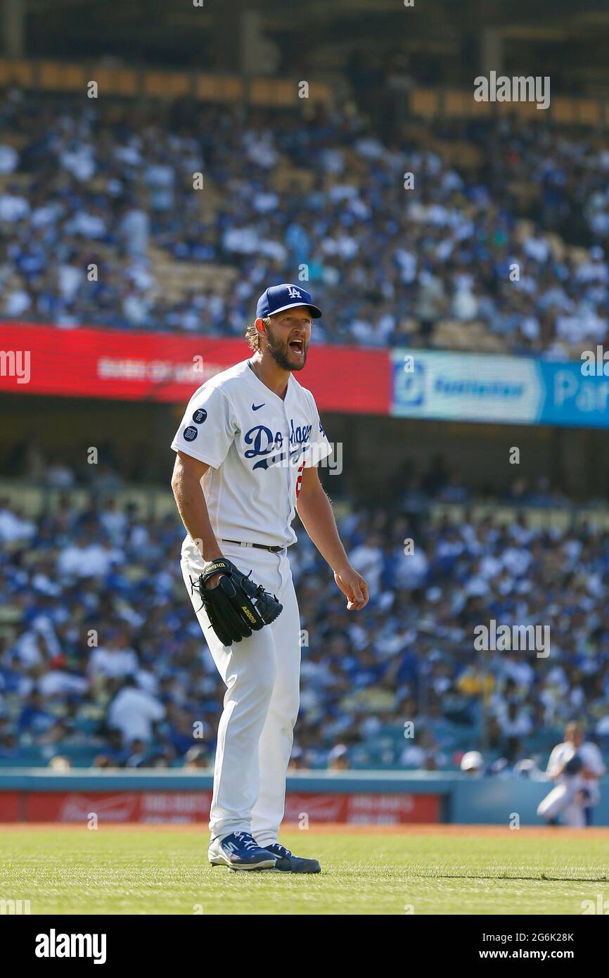 Los Angeles Dodgers pitcher Clayton Kershaw (22) argues with first base