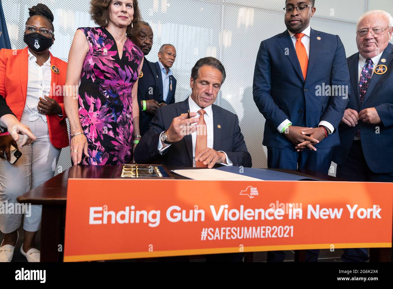 Governor Andrew Cuomo makes an announcement regarding gun violence in the state at John Jay College of Criminal Justice. Governor declared Disaster Emergency in order to tackled gun violence across the state. He announced the program to create well paying jobs, education, sport programs with investment by state by $138, 7 million. He was joined by anti-gun activists, clergy and union leaders who will help to implement this program. He also signed legislation Hold Gun Manufacturers Liable for Their Products Creating a Public Nuisance and closing loophole allowing people with Outstanding Warrant Stock Photo