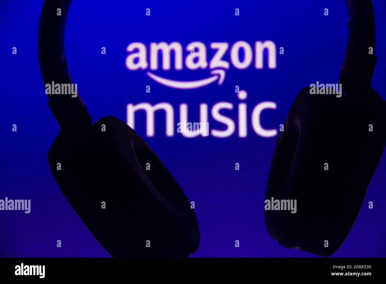 In this photo illustration, Amazon Music logo is displayed along with