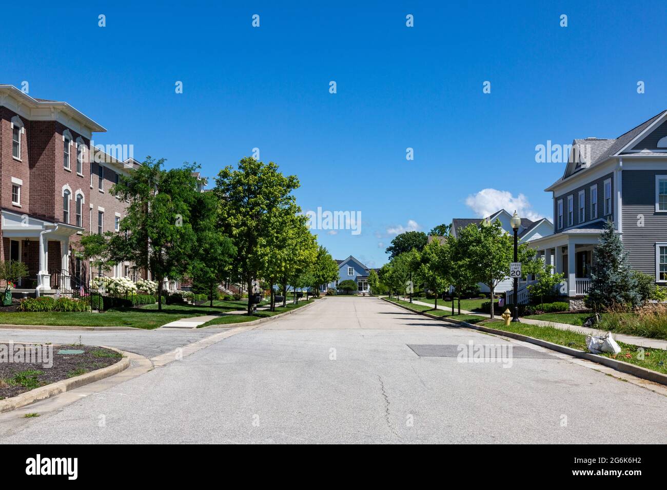 Houses line Bird Cage Walk, a residential street in Carmel, Indiana's