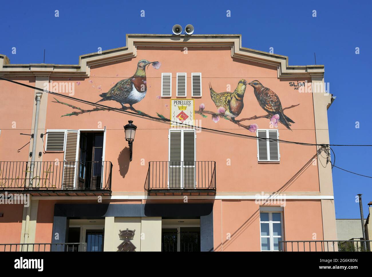 Penelles Town Hall with a mural from the Rural Art Festival, Catalonia-Spain Stock Photo