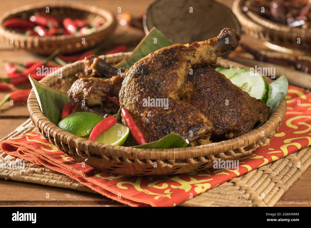 Ayam panggang. Indonesian Malaysian grilled chicken. South East Asia Food Stock Photo