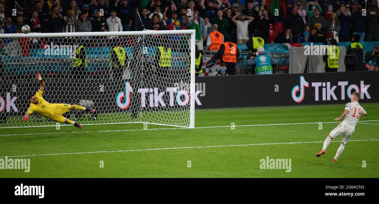 07 July 2021 - Italy v Spain - UEFA Euro 2020 Semi-Final - Wembley - London  Spain's Dani Olmo fires his penalty over the bar in the penalty shootout Picture Credit : © Mark Pain / Alamy Live News Stock Photo