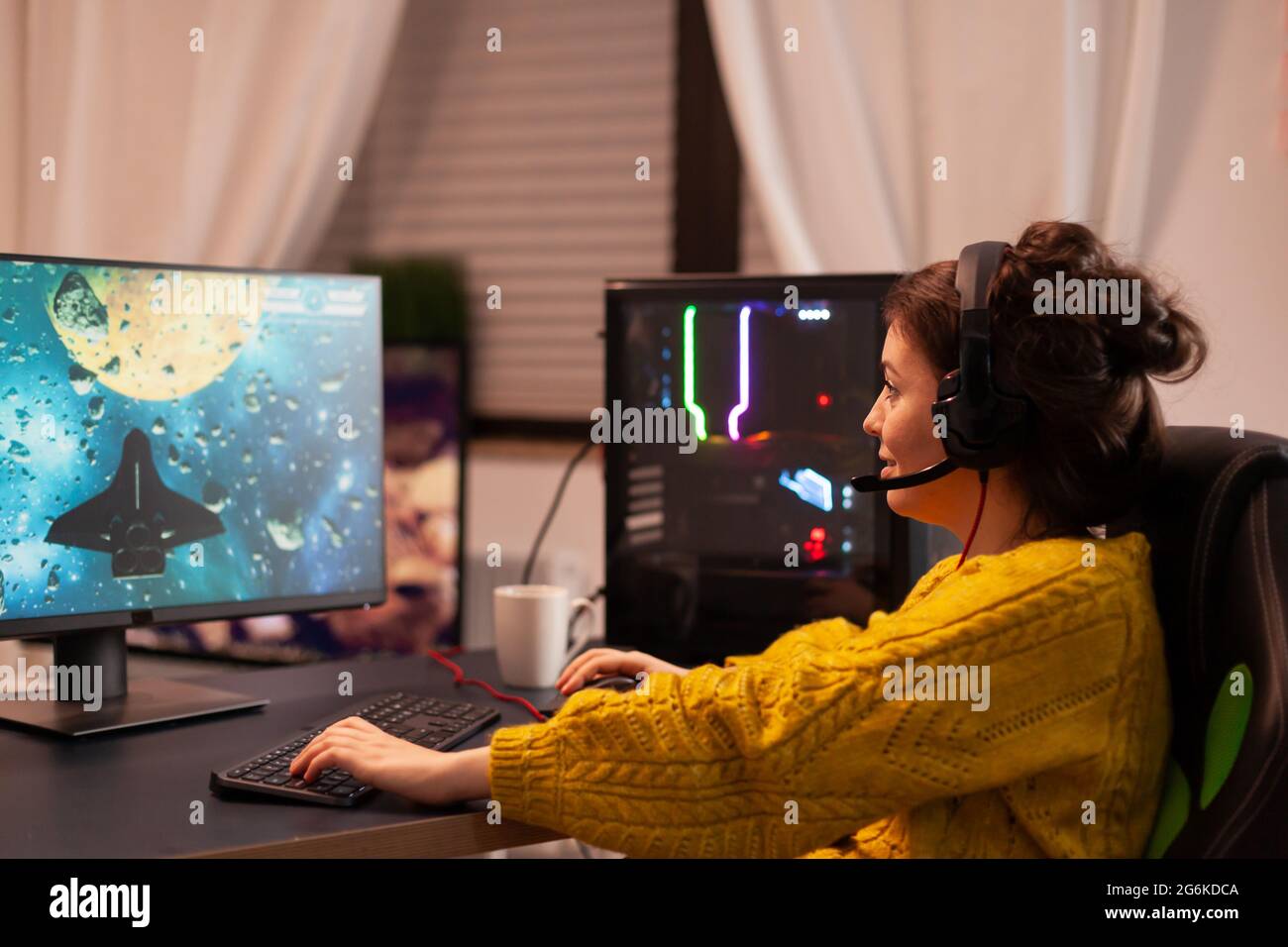Pro Player Gamer Young Asian Woman Playing Online Video Game Shooting Fps  Tournament Ranking Cyber Internet At Night Red Neon Light Room With Gaming  Headset And Keyboard On Championship Event Stock Photo 