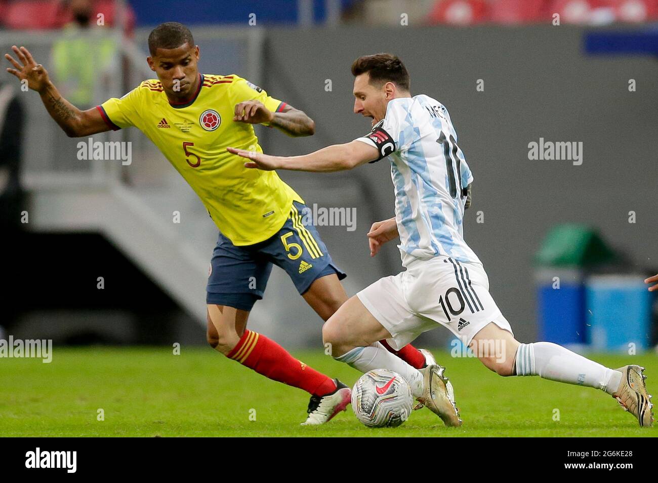 Brasilia, Brazil. 6th July, 2021. Lionel Messi (R) of Argentina vies with Wilmar Barrios of Colombia during the 2021 Copa America Semifinals football match between Argentina and Colombia in Brasilia, Brazil, on July 6, 2021. Credit: Lucio Tavora/Xinhua/Alamy Live News Stock Photo